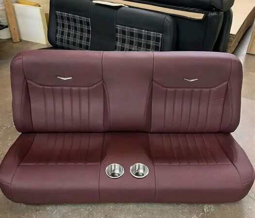 Distressed burgundy LB with center bolsters, SS cups, and V medallions